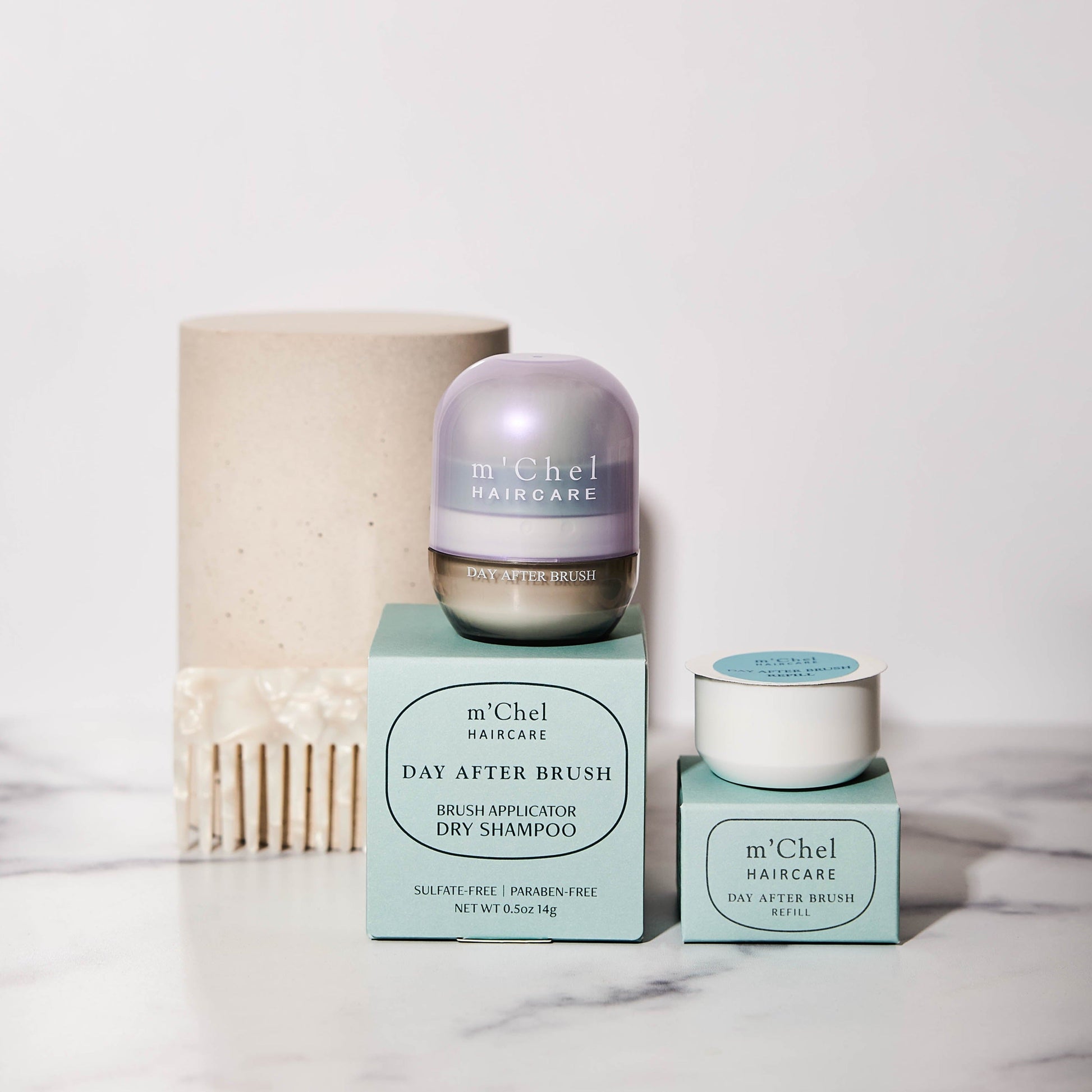 m'Chel Haircare  Brush + Shampoo
