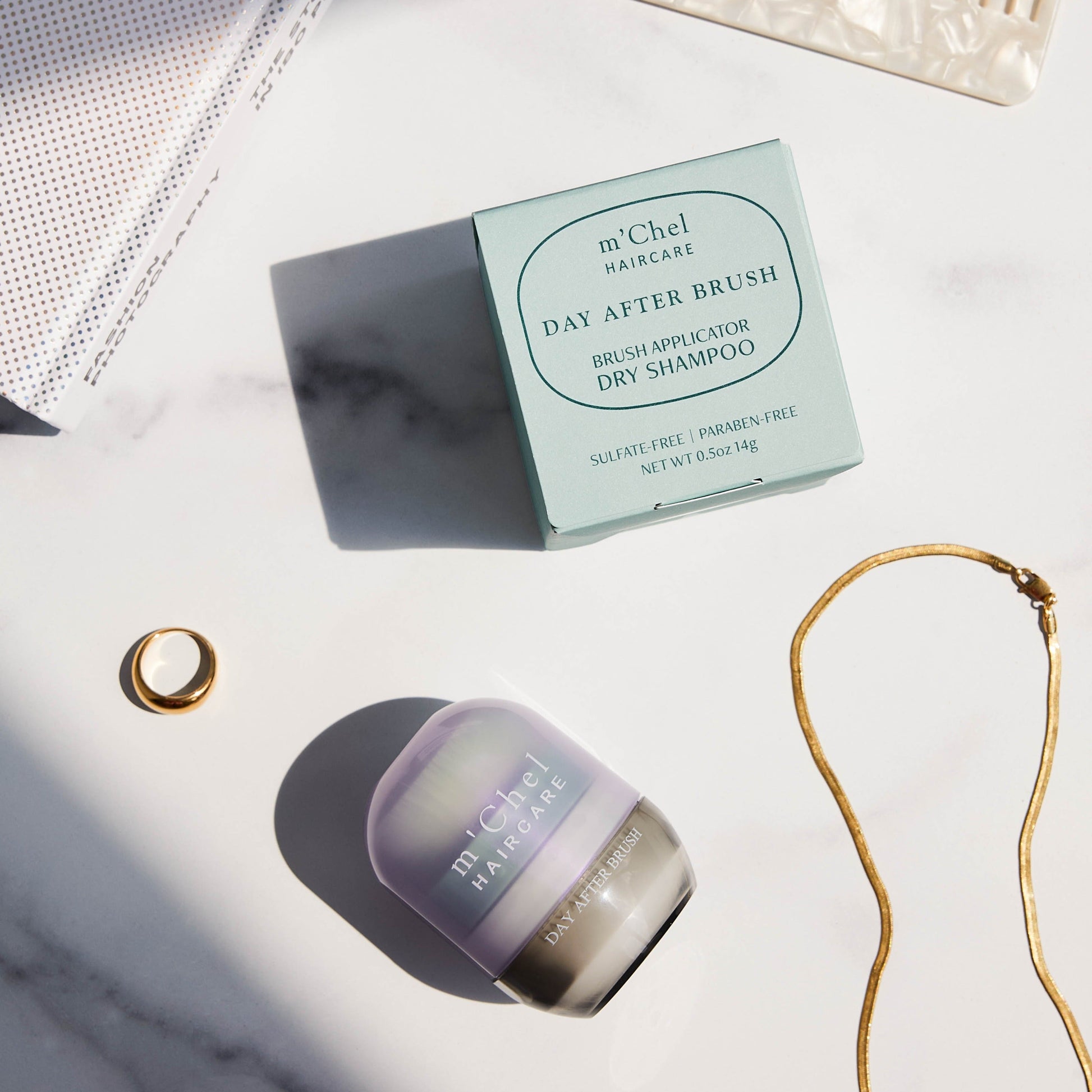 m'Chel Haircare  Brush + Shampoo